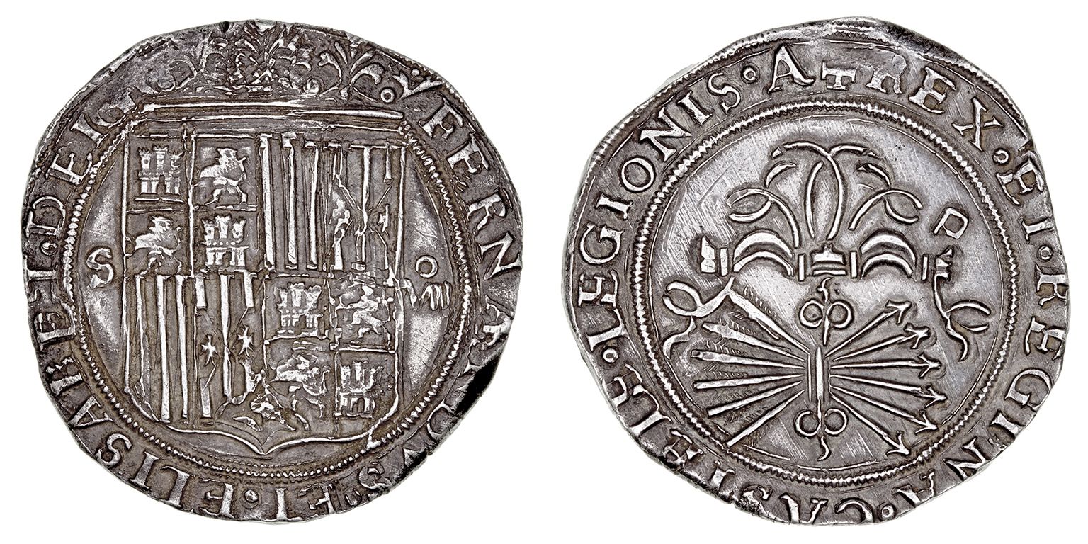 Серебряная монета испанских монархов, после 1497 г. надпись «Фердинанд и Элизабет милостью Божьей», герб испанского императора, слева читается буква s - знак монетного дома Севильи, справа  VII